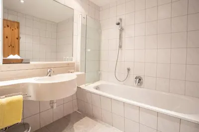 Ein Badezimmer in der Unterkunft Appartements Spullersee