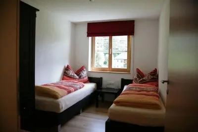 Ein Bett oder Betten in einem Zimmer der Unterkunft Haus Kanisblick Appartements