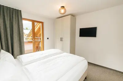 Ein Bett oder Betten in einem Zimmer der Unterkunft Margarethe Apartments Lech