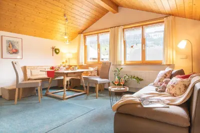 Ein Sitzbereich in der Unterkunft Gästehaus Graf