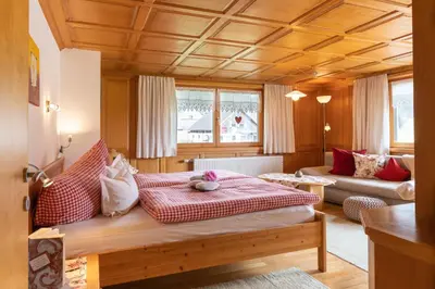 Ein Bett oder Betten in einem Zimmer der Unterkunft Gästehaus Graf