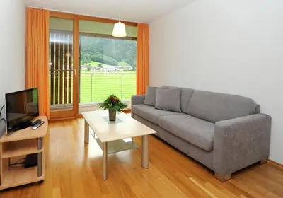 Ein Sitzbereich in der Unterkunft Apartments Susanne