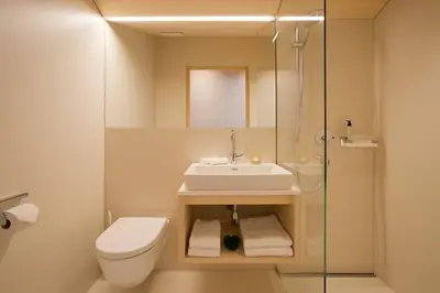 Ein Badezimmer in der Unterkunft WarthsAp Apartmenthaus