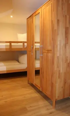 Ein Bett oder Betten in einem Zimmer der Unterkunft Ferienwohnung Därflihof