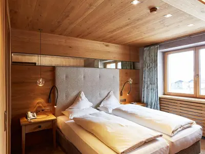 Ein Bett oder Betten in einem Zimmer der Unterkunft Hotel Auriga