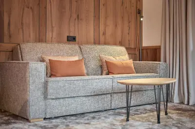Ein Sitzbereich in der Unterkunft Hotel Auriga