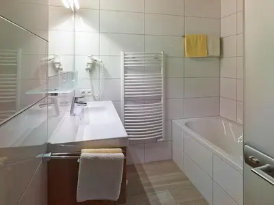 Ein Badezimmer in der Unterkunft Chalet Rüfikopf