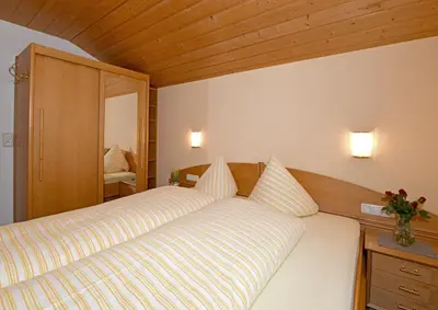 Ein Bett oder Betten in einem Zimmer der Unterkunft Rüf Wohlfühl-Apartments