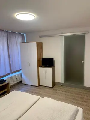 Ein Bett oder Betten in einem Zimmer der Unterkunft Smart Stay Rooms Feldkirch