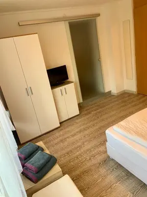 Ein Bett oder Betten in einem Zimmer der Unterkunft Smart Stay Rooms Feldkirch