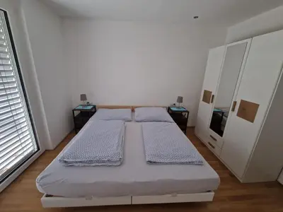 Ein Bett oder Betten in einem Zimmer der Unterkunft Ferienwohnung Jolina