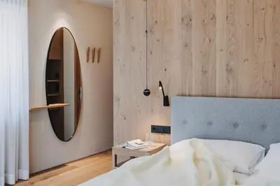 Ein Bett oder Betten in einem Zimmer der Unterkunft Hotel Alpenrose