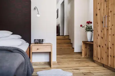 Ein Bett oder Betten in einem Zimmer der Unterkunft Hotel Alpenrose