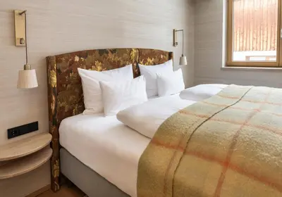 Ein Bett oder Betten in einem Zimmer der Unterkunft Hotel Schranz - Ski In & Ski Out