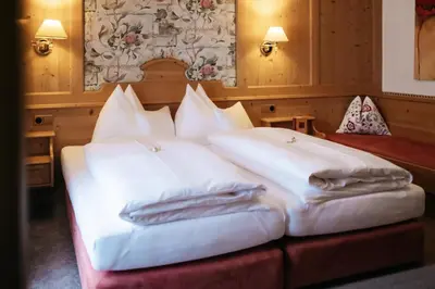 Ein Bett oder Betten in einem Zimmer der Unterkunft Hotel Kristall