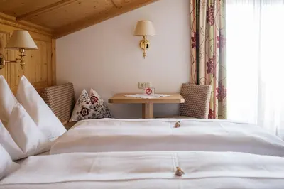 Ein Bett oder Betten in einem Zimmer der Unterkunft Hotel Kristall