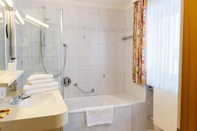Ein Badezimmer in der Unterkunft Hotel Kristall