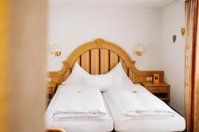 Ein Bett oder Betten in einem Zimmer der Unterkunft Hotel Kristall