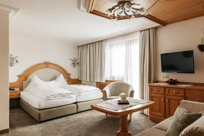 Ein Bett oder Betten in einem Zimmer der Unterkunft Hotel Kristall
