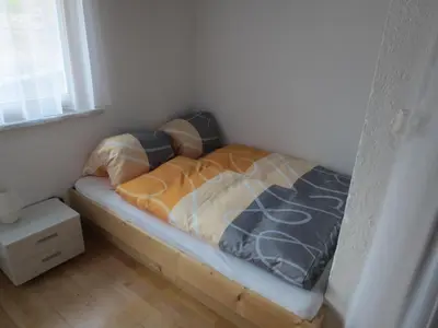 Ein Bett oder Betten in einem Zimmer der Unterkunft Haus Rünzler