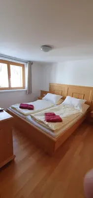 Ein Bett oder Betten in einem Zimmer der Unterkunft Haus Johanneshof 1604