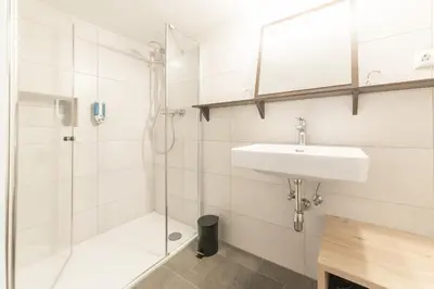Ein Badezimmer in der Unterkunft Hotel Sonne
