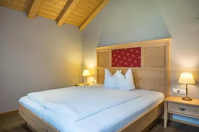 Ein Bett oder Betten in einem Zimmer der Unterkunft Hotel Sonne