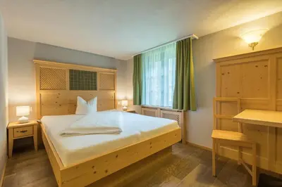 Ein Bett oder Betten in einem Zimmer der Unterkunft Hotel Sonne