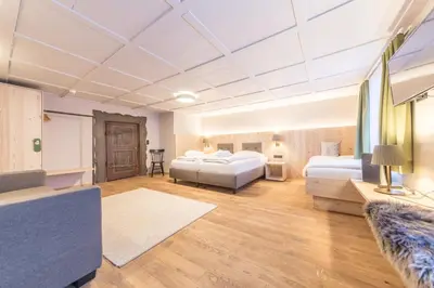 Ein Bett oder Betten in einem Zimmer der Unterkunft Hotel Sonne