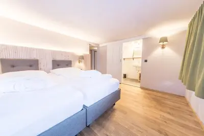 Ein Bett oder Betten in einem Zimmer der Unterkunft Hotel Sonne