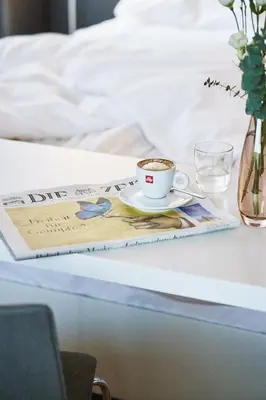 Ein Bett oder Betten in einem Zimmer der Unterkunft Hotel am See