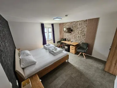 Ein Bett oder Betten in einem Zimmer der Unterkunft Gasthaus Sofram