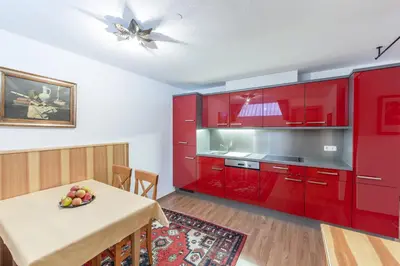 Küche/Küchenzeile in der Unterkunft Ferienwohnungen & Chalets Capricorno