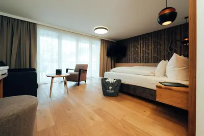 Ein Bett oder Betten in einem Zimmer der Unterkunft Hotel Tradizio