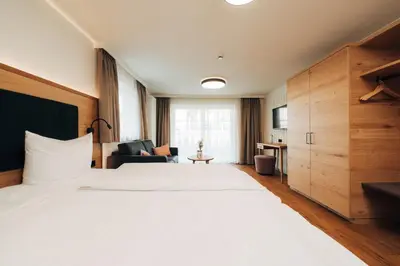 Ein Bett oder Betten in einem Zimmer der Unterkunft Hotel Tradizio