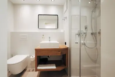 Ein Badezimmer in der Unterkunft Hotel Tradizio
