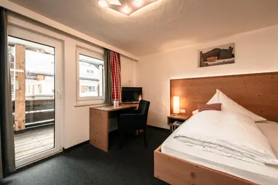 Ein Bett oder Betten in einem Zimmer der Unterkunft Hotel Tradizio