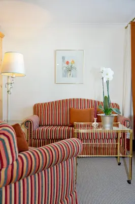 Ein Sitzbereich in der Unterkunft Hotel Angela