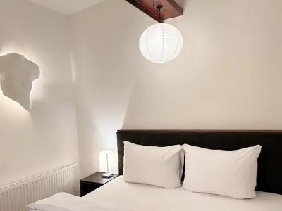 Ein Bett oder Betten in einem Zimmer der Unterkunft S'Matt Bob