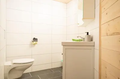 Ein Badezimmer in der Unterkunft Haus Alpina