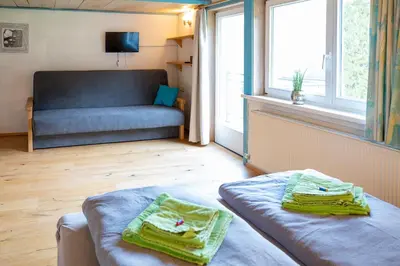 Ein Bett oder Betten in einem Zimmer der Unterkunft Haus Alpina