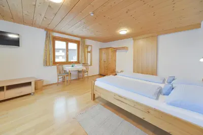 Ein Bett oder Betten in einem Zimmer der Unterkunft Pension Haus Romy