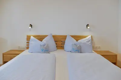 Ein Bett oder Betten in einem Zimmer der Unterkunft Pension Haus Romy