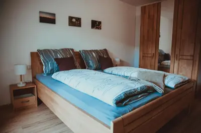Ein Bett oder Betten in einem Zimmer der Unterkunft Ferienwohnung Thannen