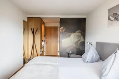 Ein Bett oder Betten in einem Zimmer der Unterkunft Panoramahotel Sonnhalde