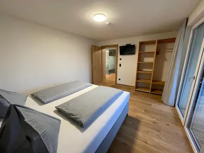 Ein Bett oder Betten in einem Zimmer der Unterkunft Panoramahotel Sonnhalde