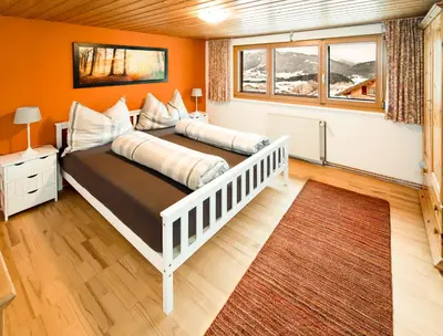 Ein Bett oder Betten in einem Zimmer der Unterkunft Ferienhaus Bergblick