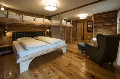 Ein Bett oder Betten in einem Zimmer der Unterkunft Auenhütte