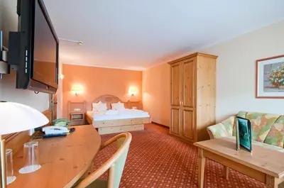 Ein Bett oder Betten in einem Zimmer der Unterkunft Suitehotel Kleinwalsertal