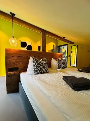 Ein Bett oder Betten in einem Zimmer der Unterkunft KWT Lodge